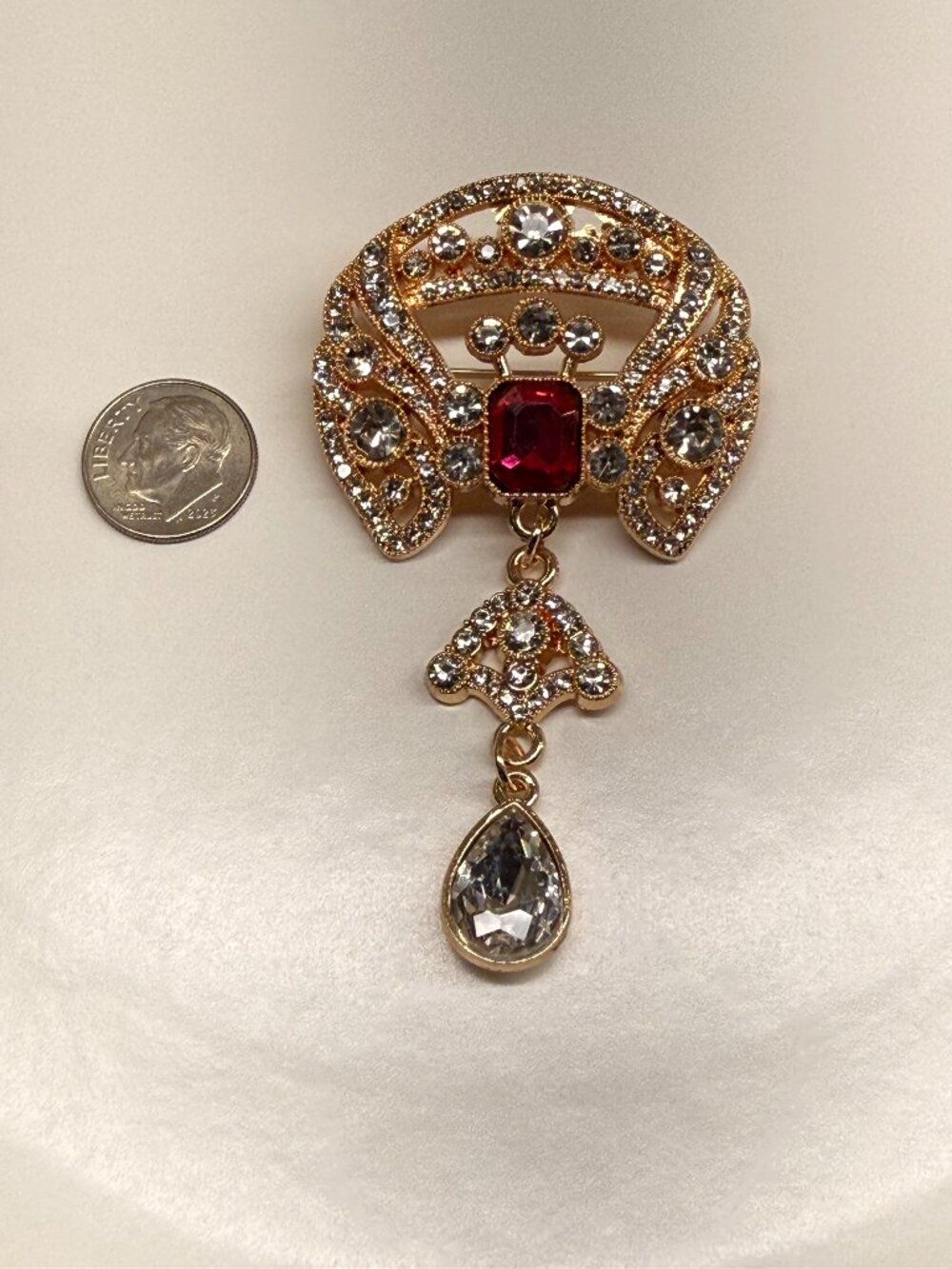 New Ruby color rhinestones brooch pin. measurement is 2" Wide by 3" long